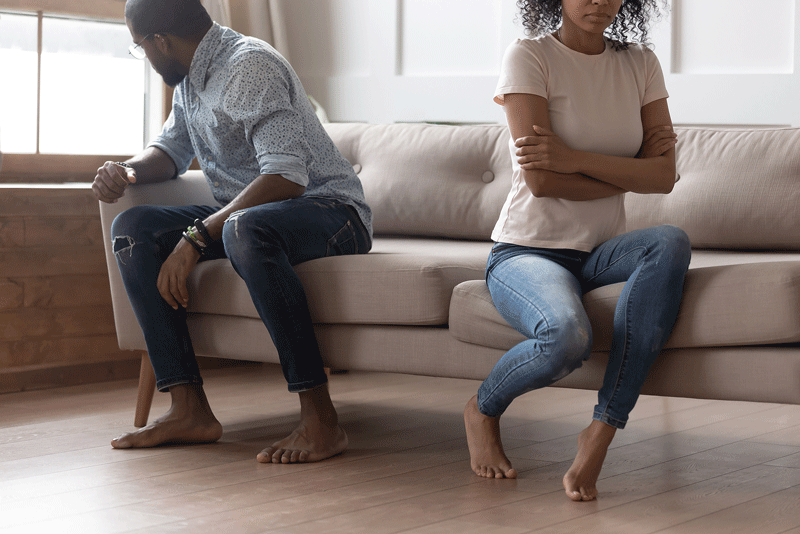 A couple sits facing away from one another while appearing to argue. This could represent a lack of relationship fulfillment in Ontario, CA. Learn more about how a therapist in Ontario can offer support with signs of an unfulfilled life. 