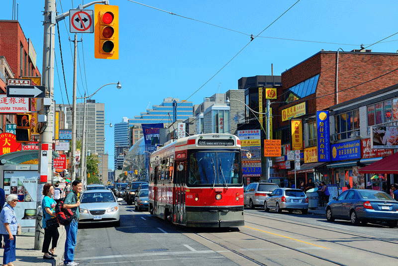 view of the Chinatown district of Toronto's downtown on a sunny day. Learn more about therapy for finding fulfillment in Ontario by searching for a self fulfillment therapist in Ontario, CA today. Search for self fulfillment in Toronto, CA for more info.